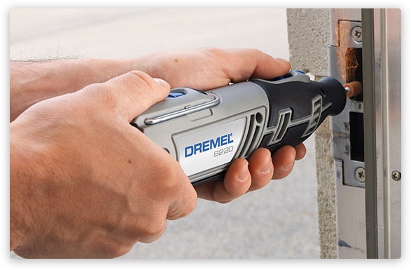 Person using Dremel to drill